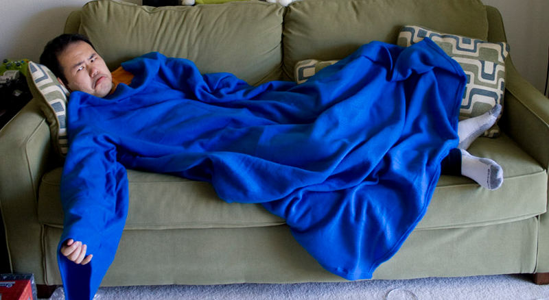 Illustration for article titled Ultimate Battle: The Snuggie vs. Slanket vs. Freedom Blanket vs. Blankoat